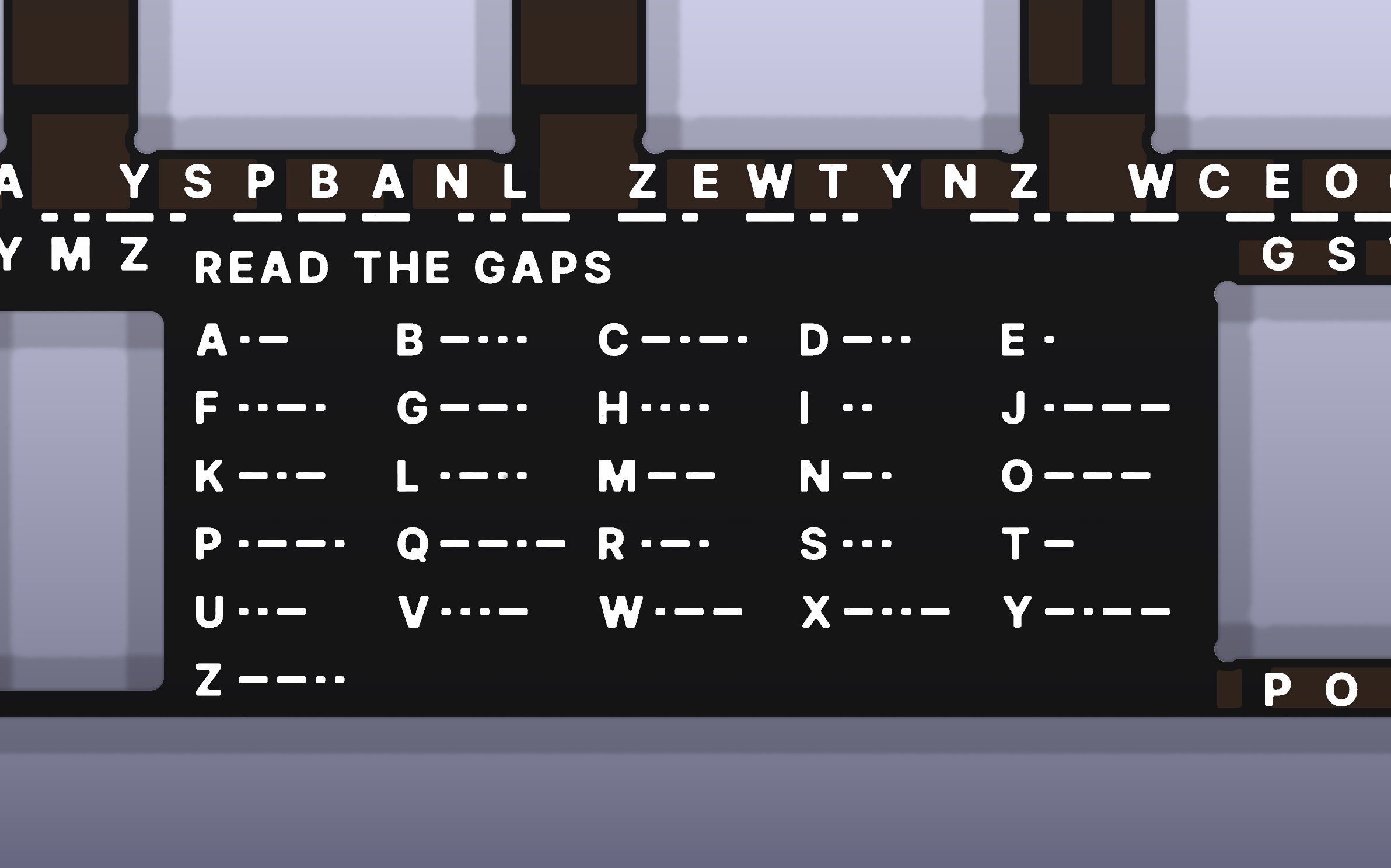 A close view of the Sasqwerty plate: white letters between the switch openings and a Morse key headed Read the gaps