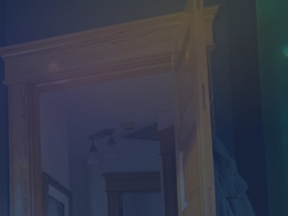 A softly lit doorway in the room behind the mycratherapy.org home-page headline